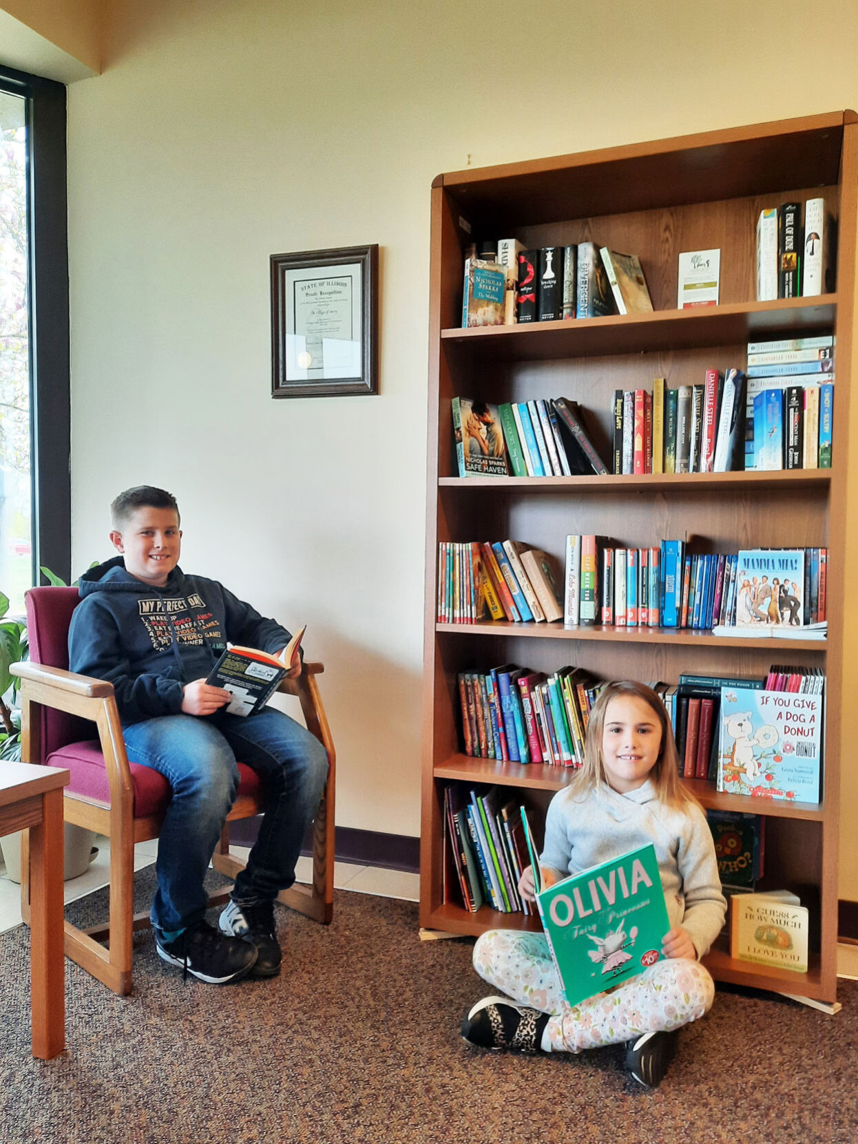 Alex and Sophie Dykstra Savoy little library.jpg